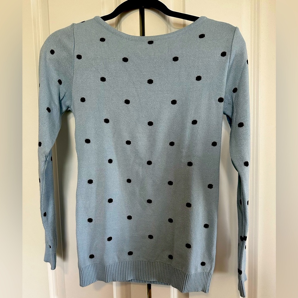Knit light blue with brown circles